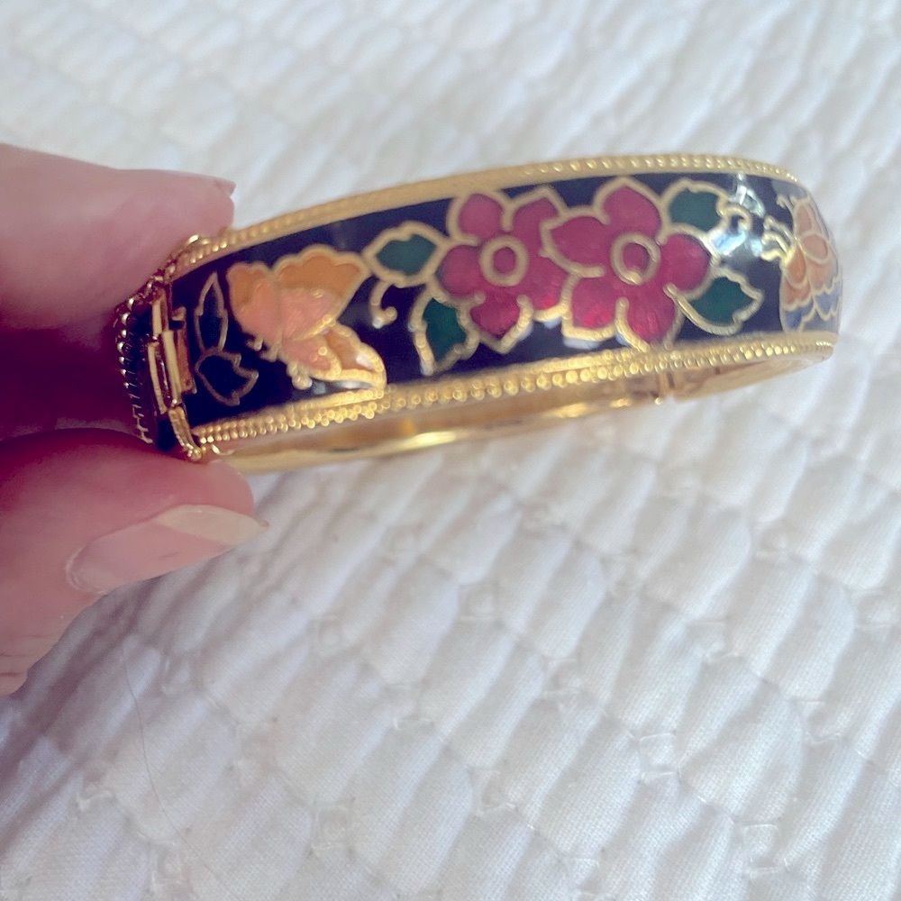 Cottagecore Hinged Bangle Bracelet with Gold and Red Floral Enameled Design.